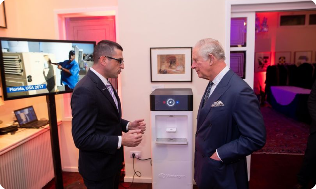 King Charles III tries water from Genny machine