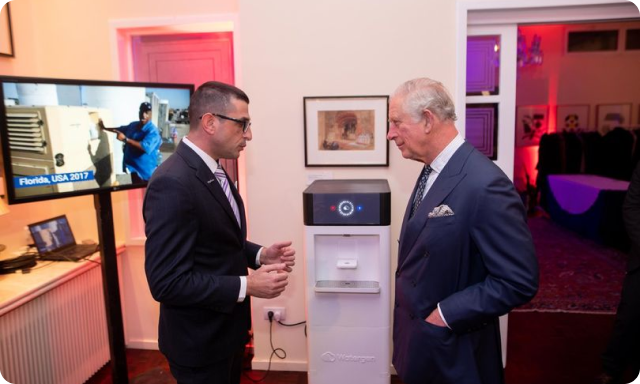 His Majesty King Charles III tries water from Genny machine